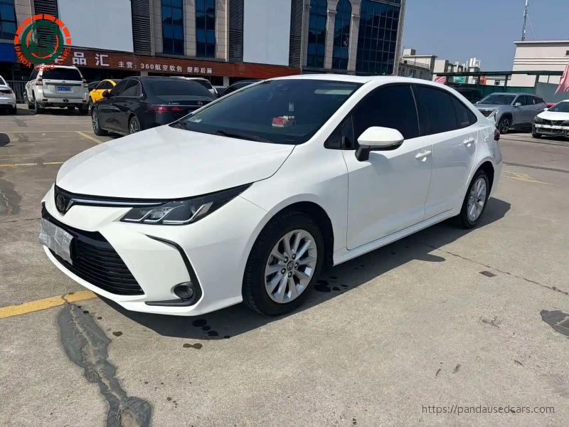 White 2019 Toyota Corolla sedan, representative used vehicle
