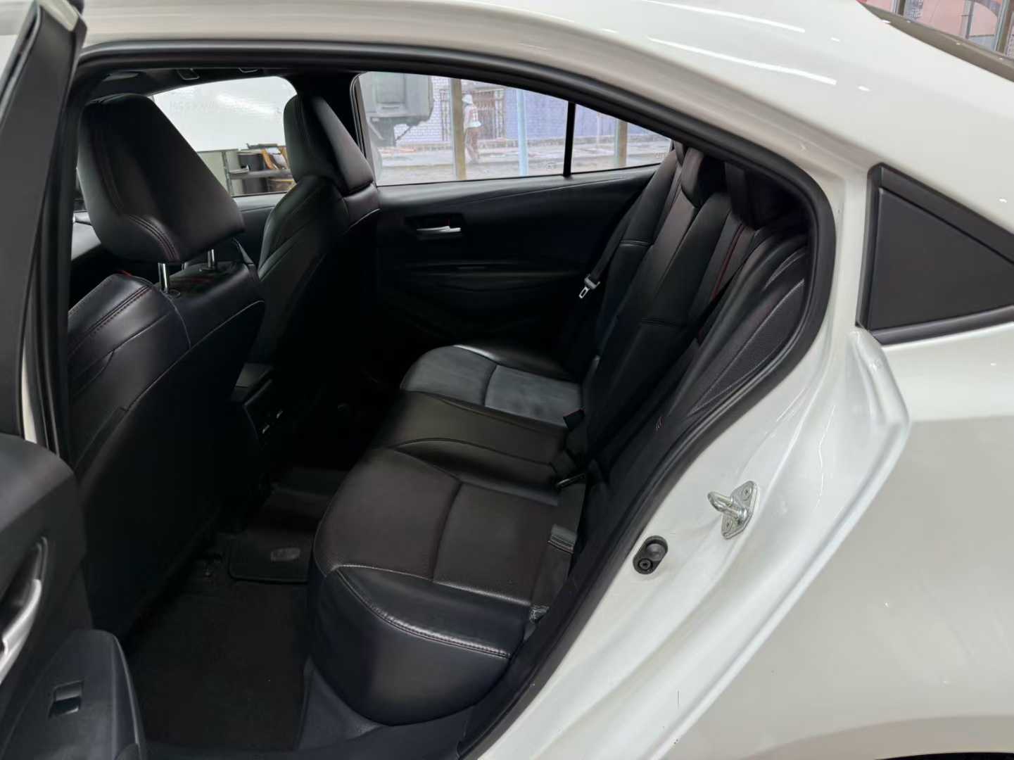White 2022 Toyota Corolla sedan, representative used export vehicle